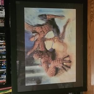 Signed Spiderman framed drawing with a vintage Batman and Wolverine tin wall han